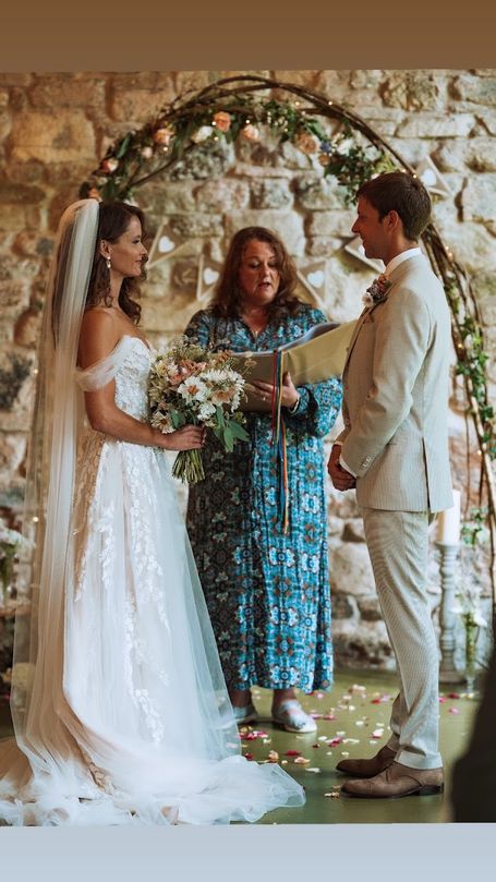 Sara Cumming - Celebrant reading a Wedding Script to a Bride and groom